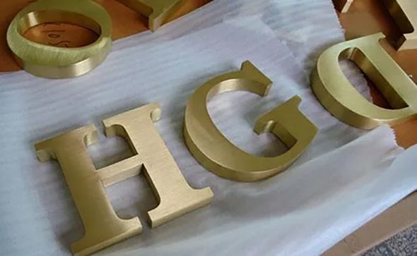 Brushed brass letters
