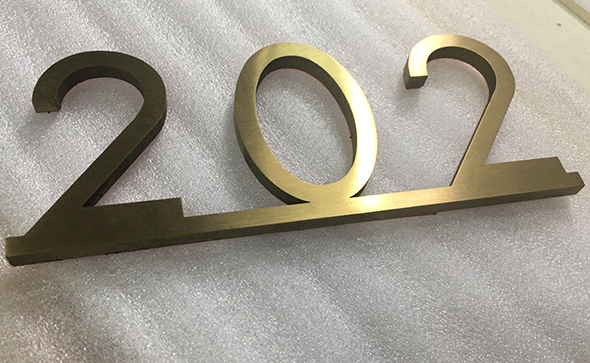 Titanium plated stainless steel signs