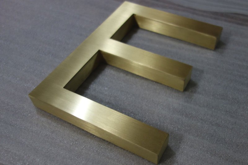 Fabricated brass letters